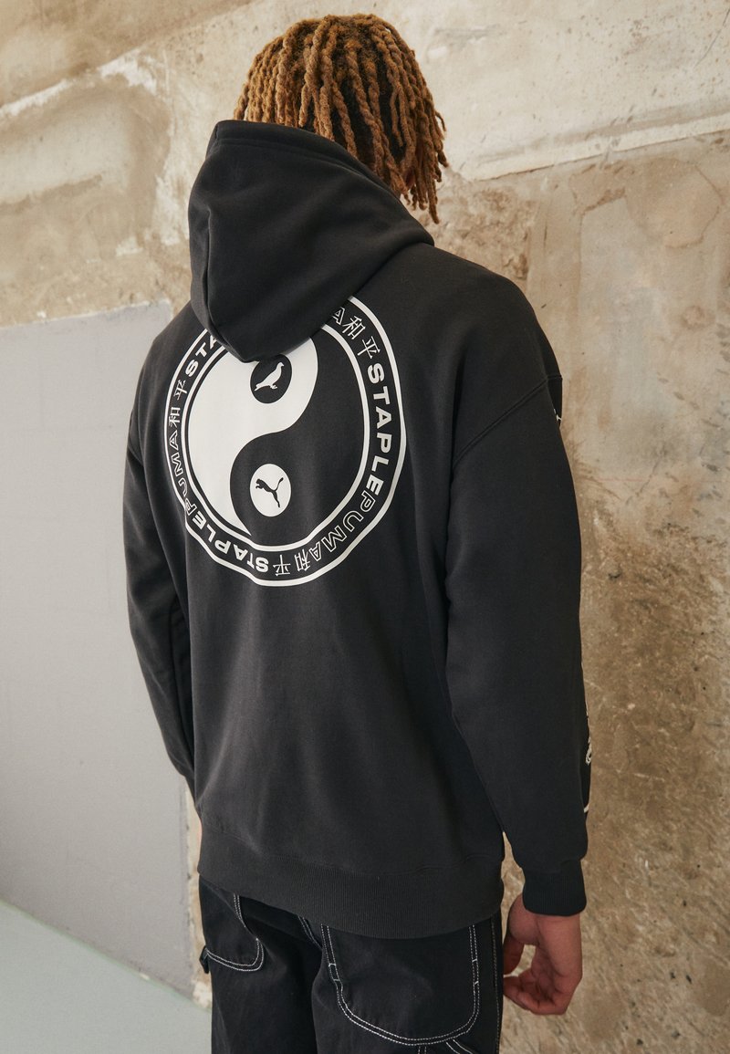 Stapling Graphics Puma STAPLE GRAPHIC HOODIE - Sweatshirt - black/schwarz - Zalando