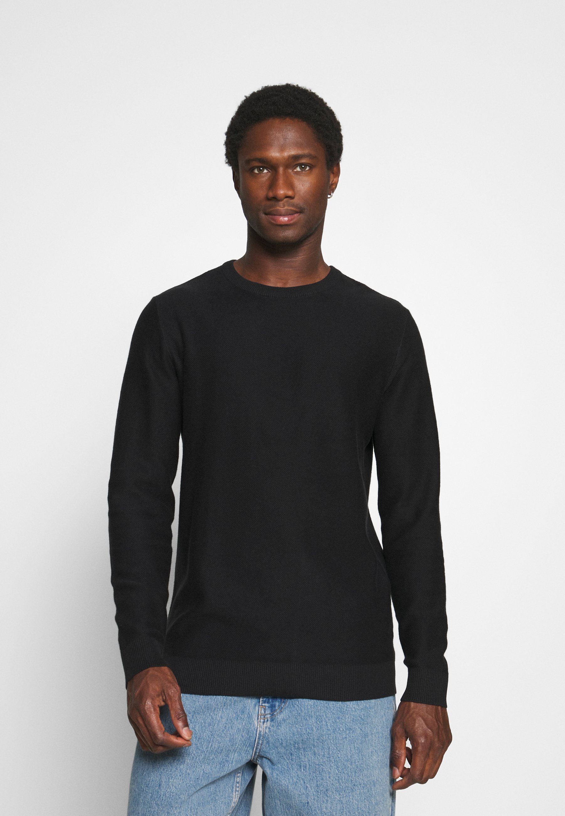 black crew neck sweaters
