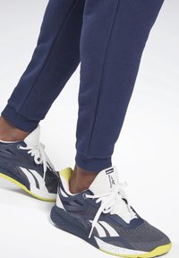 Reebok Träningsbyxor - dark blue