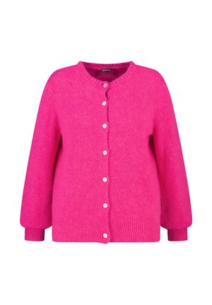 Felroze, knoopvest met ronde halslijn, gestructureerde stof, lange mouwen en geribbelde boorden aan mouwen en zoom. Voorzien van kleine witte knopen.