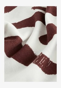 Wybrany, brown white zebra