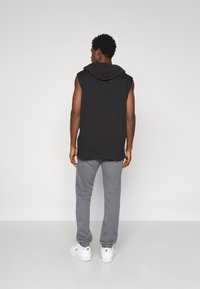 Champion ICONS TONAL CUFF LARGE LOGO - Joggebukse - foggy