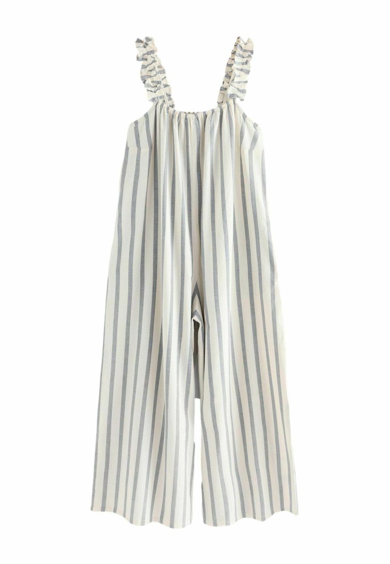 Combinaison rayée en blanc et bleu clair, avec des bretelles volantées, une taille élastique et une coupe large. Fabriquée en tissu léger.