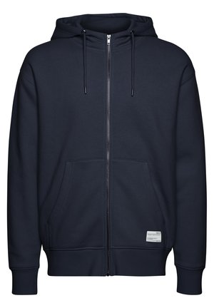 Námornícky modrá mikina na zips vyrobená z mäkkej tkaniny, s kapucňou na šnúrky, prednými vreckami, ribovými manžetami a malou logom nášivkou.