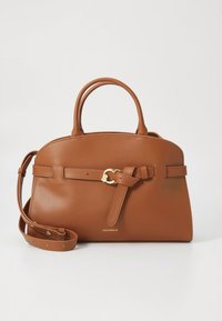 Brown leather handbag with a structured design, top handles, and a detachable shoulder strap. Features a belt detail and gold hardware accent.