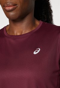 ASICS CORE TOP - Sports T-shirts - deep mars