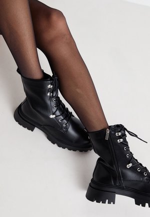 Platform ankle boots - black