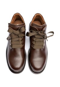 Brown leather shoes with a smooth finish. Features wide khaki laces, gold eyelets, and a round toe. Soft, tan inner lining visible.