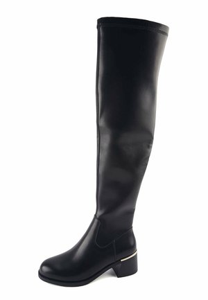 Botte noire en cuir montant jusqu’au genou, avec un petit talon carré et une bordure dorée décorative sur le bord du talon.