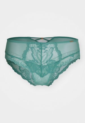 Braguitas de encaje en teal con un patrón floral, detalles de malla transparente y bordes en forma de onda. Incluye un diseño entrecruzado en la parte trasera.