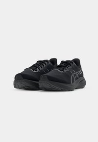Black athletic shoes with a textured synthetic upper, rounded toe, thick cushioned midsole, and rubber outsole featuring tread patterns.