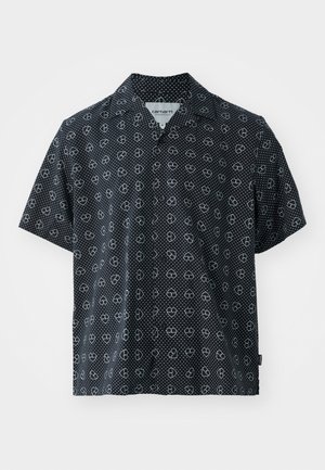 Short-sleeve shirt in black fabric featuring white polka dots and heart patterns. Notched collar; relaxed fit; light texture.