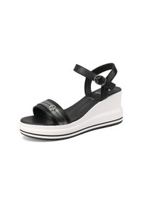 Sandali con zeppa neri, dotati di una fascia lucida, cinturino alla caviglia regolabile e una spessa suola bianca con un dettaglio a striscia nera.