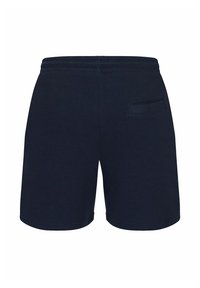 Marinblå shorts i ribbat tyg, med resårmidja och en bakficka på högra sidan. Slät textur och enkel design.