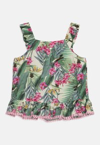Tank top kukka-aiheilla, jossa on frill-hihnat, trooppinen kuvio vaaleanpunaisista kukista ja vihreistä lehdistä, röyhelöhelma vaaleanpunaisilla pom-pom-reunuksilla.