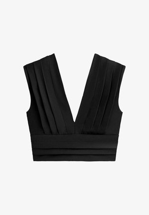 Top court noir sans manches avec un col en V profond, des plis verticaux sur les panneaux avant et des plis horizontaux à la ceinture.