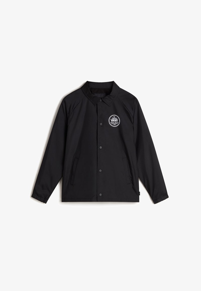 Veste coupe-vent noire avec une fermeture à boutons sur le devant, des manches raglan, deux poches latérales et un logo circulaire Vans sur la poitrine gauche. Texture lisse.