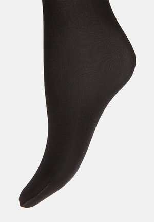 Chaussettes noires transparentes jusqu'à la cheville avec une texture lisse et un design sans couture. Présentent un bout arrondi et un ajustement serré autour du pied.