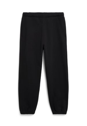 Pantalons de survêtement noirs avec taille élastique et poignets, poches latérales et un petit logo brodé sur la cuisse droite.