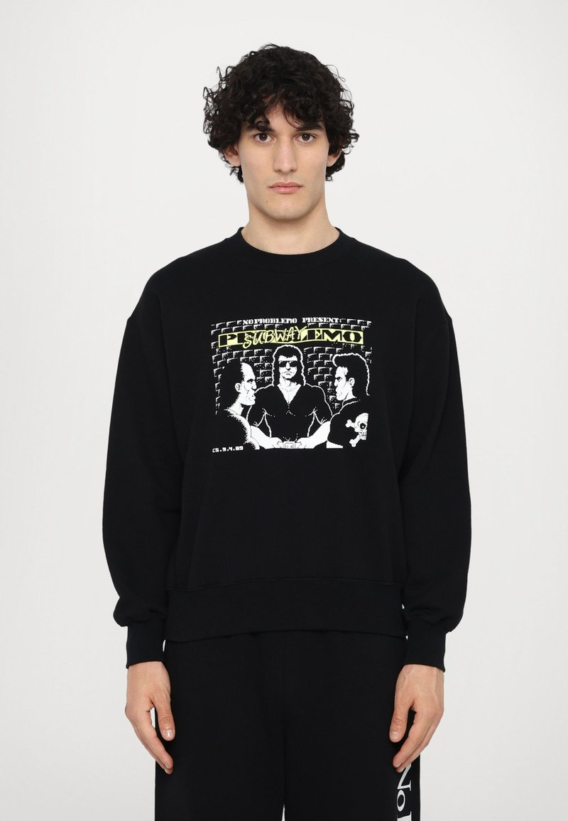 Black sweatshirt made of cotton with a relaxed fit. Features a graphic print in white and yellow depicting three characters.