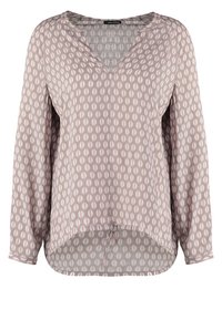 Blouse à manches longues de couleur rose clair avec un motif géométrique en teintes plus foncées. Présente un décolleté en V et un détail froncé à l'ourlet.