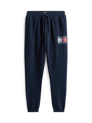 Pantaloni della tuta navy realizzati in morbido tessuto, con vita elasticizzata e cordino, polsini affusolati e logo stampato sulla coscia.