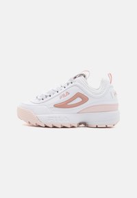 White athletic sneakers with pink accents, featuring a textured upper, thick sole, and lace closure. Logo displayed on the side.