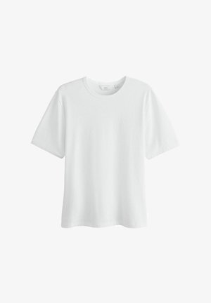 Yksinkertainen valkoinen lyhythihainen puuvillainen T-paita pyöreällä pääntiellä, keskikoko, esillä yksivärisellä valkoisella taustalla.