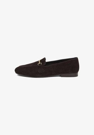 Dark brown suede loafer with low heel and gold metal bit detail on top, angled sideways on a white background.
