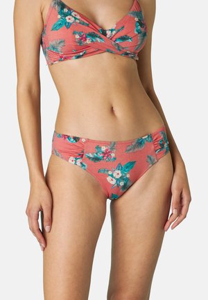 Set bikini corallo con motivo floreale e dettagli in teal e bianco. Il top ha un design incrociato, mentre i pantaloni hanno arricciature laterali.