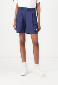 Navy blue cargo shorts made of lightweight fabric, featuring an elastic waistband, side pockets, and a small logo detail.