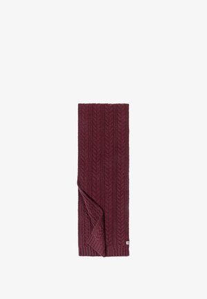 Burgundy knit scarf featuring a textured chevron pattern with a folded edge and a small white brand label sewn into the corner.