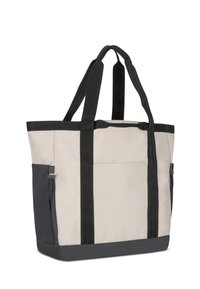 Šedá a béžová taška cez rameno s čiernymi ušami, ktorá má bočnú kapsu a pevný obdĺžnikový tvar. Odolná textília s hladkou textúrou.
