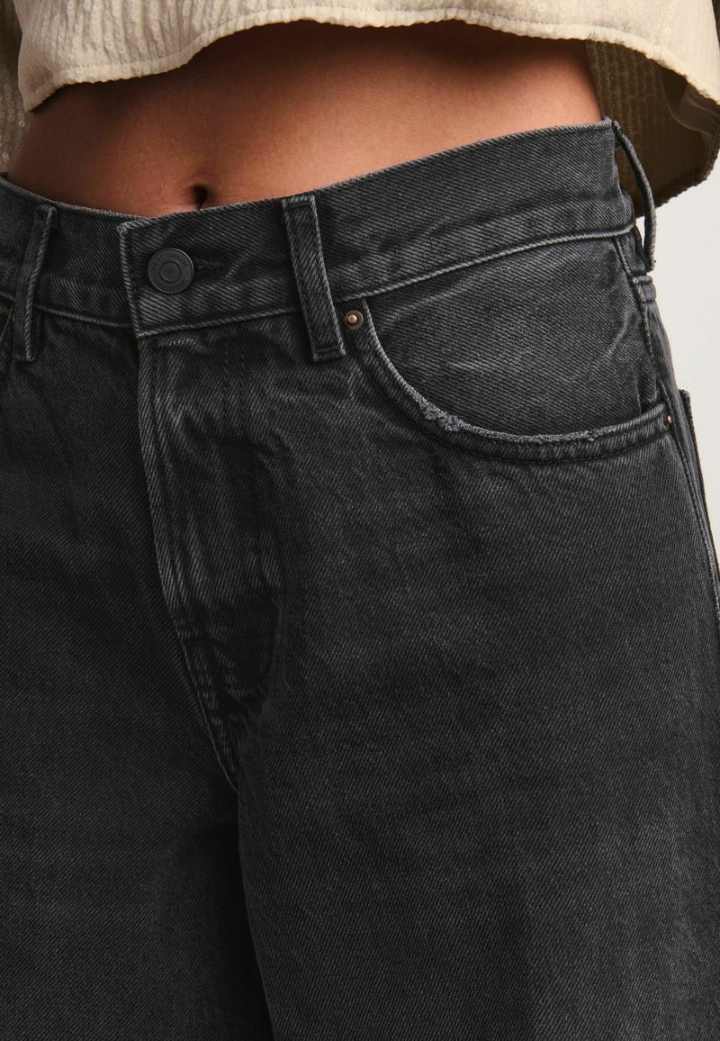 Next RIGID WIDE TALL - Flared Jeans - washed black