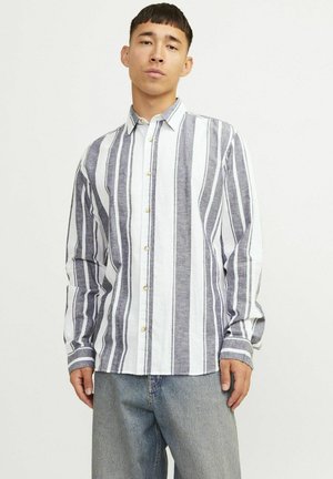 Langemouwen shirt met blauw-witte verticale strepen, met knoopsluiting en messing knopen. Gemaakt van lichtgewicht stof.