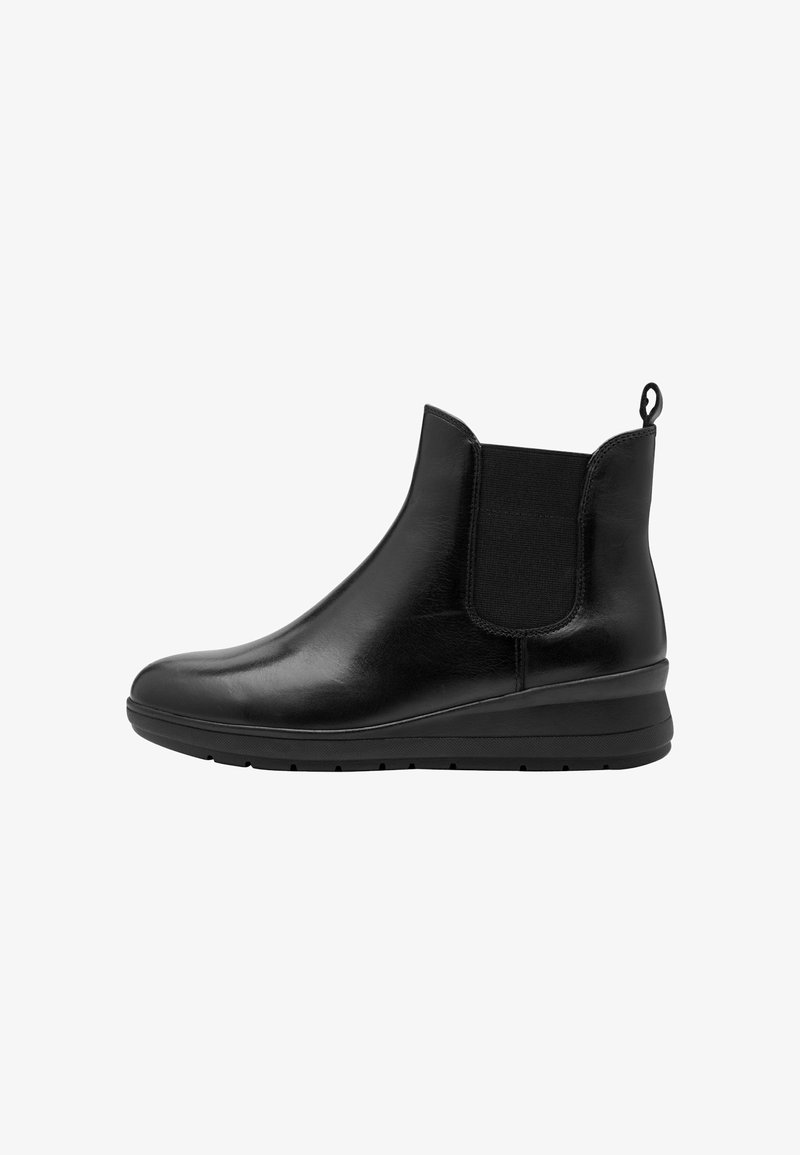Bottines en cuir noir avec des panneaux élastiques sur les côtés, texture lisse, bout rond et semelle compensée pour plus de hauteur.