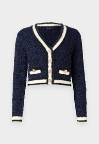 Cardigan lavorato a maglia di colore blu navy con maniche lunghe, bordo bianco, scollo a V e bottoni dorati. Presenta due tasche frontali con dettagli decorativi.