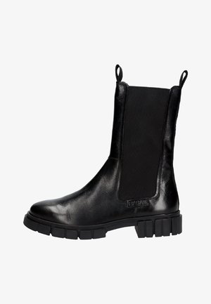 Black leather ankle boots featuring elastic panels, a rounded toe, and a chunky rubber sole with textured accents.