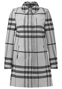 Long manteau gris avec un motif à carreaux noirs, col et poches latérales zippées, présenté à plat sur fond blanc.