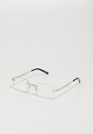 Négyzet alakú, tiszta lencséjű szemüveg vékony ezüst fém kerettel és fekete acetát végződésekkel. Minimalista kialakítással, amely elegáns megjelenést biztosít.
