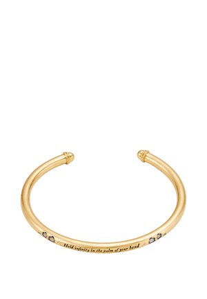 Gold-colored open cuff bracelet with small blue hearts and the engraving "Hold infinity in the palm of your hand" on the inner side.