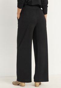 Cellbes of Sweden WIDE WITH POCKETS - Tygbyxor - black   solid