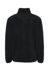 Veste en polaire noire avec un col montant, des manches longues et une surface douce et texturée. Pas de fermetures éclair ni d'ornements visibles.