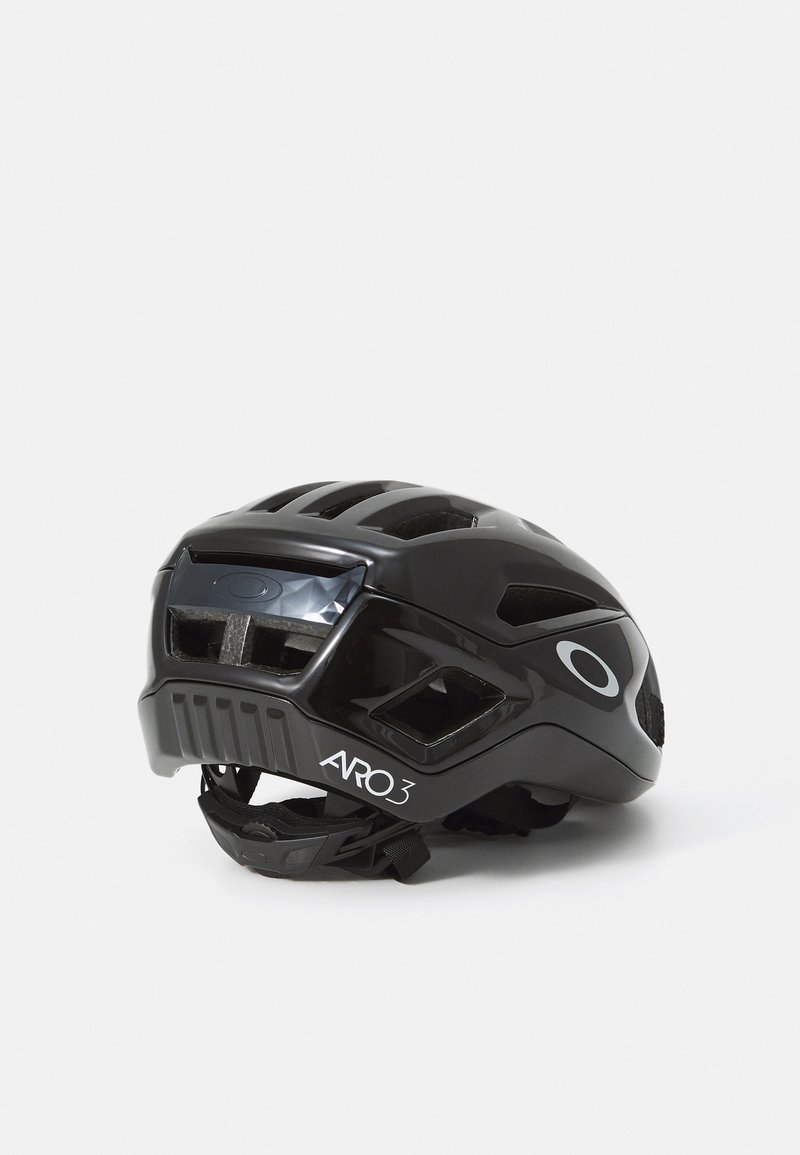 Black cycling helmet with aerodynamic design, multiple ventilation slots, and adjustable straps. Features logo and model name ARO3 on the side.