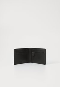 Black leather wallet featuring multiple card slots, a zippered pocket, and a smooth textured finish. Folded open for visibility.