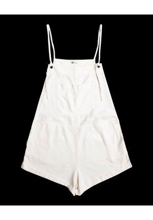 Valkoiset puuvillahaalarit ohuilla olkaimilla, joissa on sivutaskut, takatasku ja väljä istuvuus. Sileä pinta ja minimalistinen muotoilu.