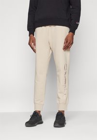 Champion ICONS CUFF PANTS LARGE LOGO - Spodnji deli trenirk - beige