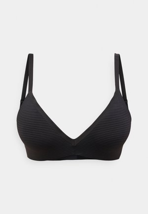 Schwarz gestreifter BH mit V-förmigem Ausschnitt und dünnen verstellbaren Trägern. Hergestellt aus weichem Material mit glatter Textur und minimalistischem Design.