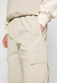 adidas Originals ESSENTIALS - Pantaloni cargo - beige