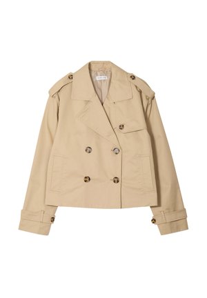 Beige kaksirivinen trench-takki, joka on valmistettu puuvillasta ja jossa on hartiapäällysteet, kaksi etutaskua ja ruskeat napit. Lyhyt malli.